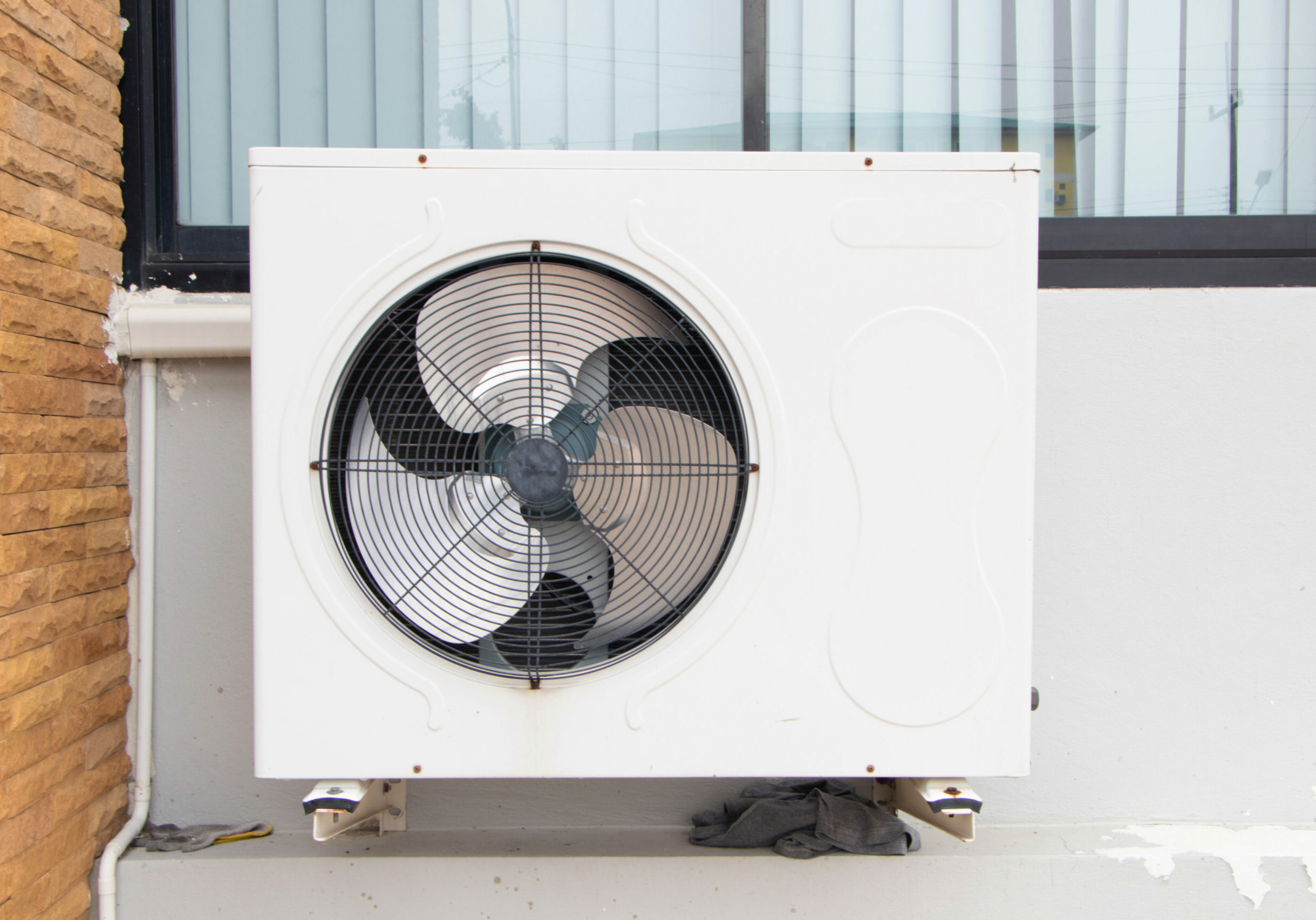 Air old conditioner compressor source heat pumps on wall outdoor on roof top of building for cooling at industrial plant. Cooling pump technology for home or office. Suitable for hot weather. Air old conditioner compressor source heat pumps on wall outdoor on roof top of building for cooling at industrial plant. Cooling pump technology for home or office. Suitable for hot weather.